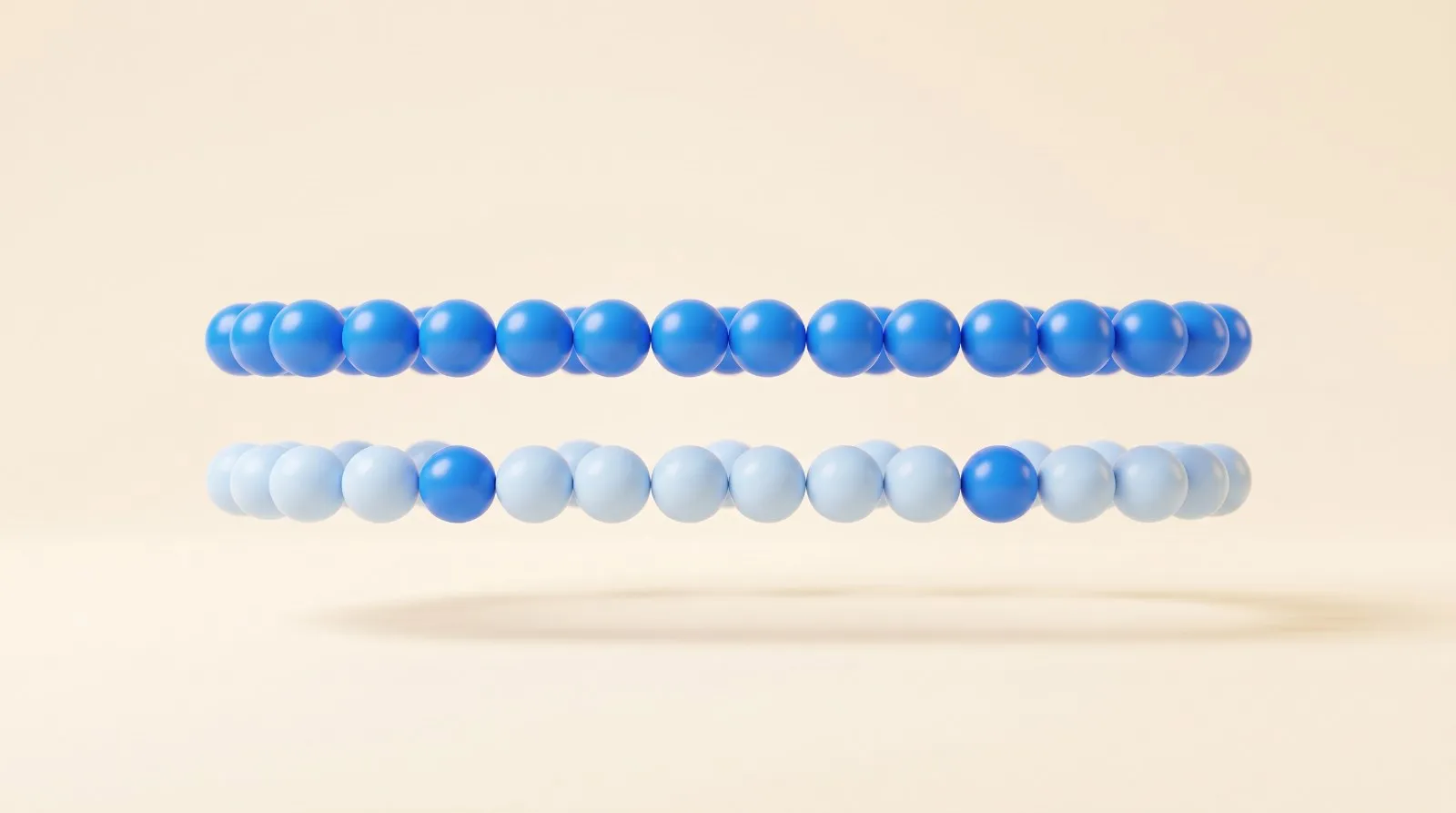 Ilustração em render suave sobre fundo creme: duas correntes horizontais de esferas flutuando uma sobre a outra, quase iguais, a de cima toda em azul vivo e a de baixo em azul-claro com duas esferas azuis vivas, como uma cópia com pequenas diferenças.
